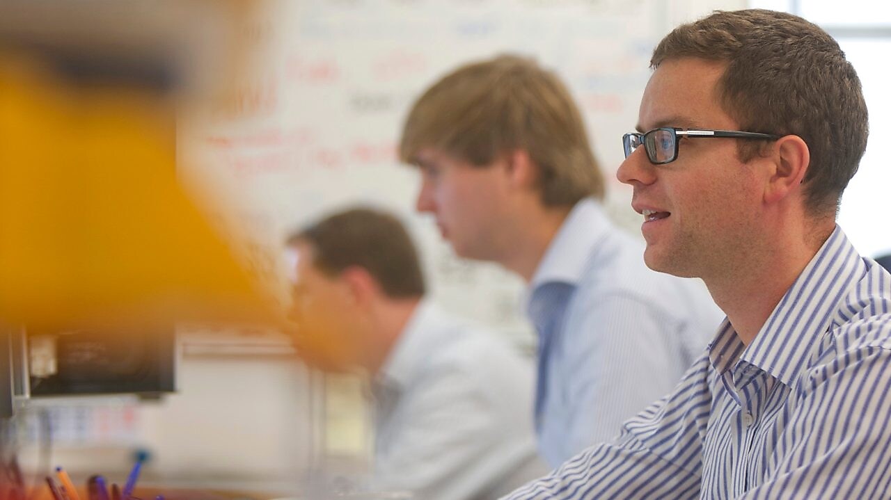 Shell Shipping and Trading staff at work in an office on The Strand, London