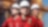 a group of people wearing hardhats and red shirts