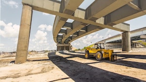 Shell construction digger truck on lubricants for construction page slider image