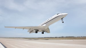 Jet plane taking off from a runway at an airport