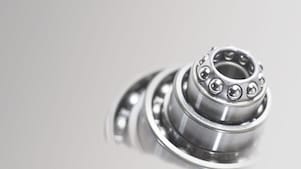 Metal cylinder with ball bearings in