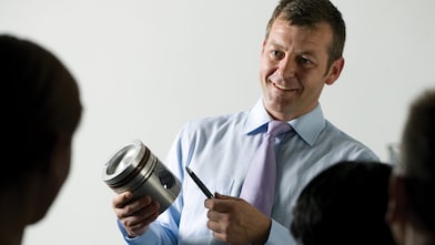 man presenting at a meeting