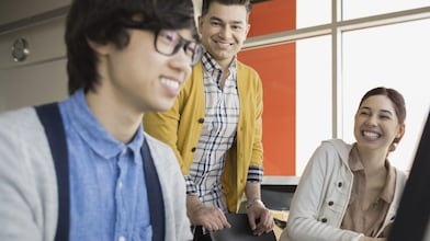 High school students and teacher in computer lab