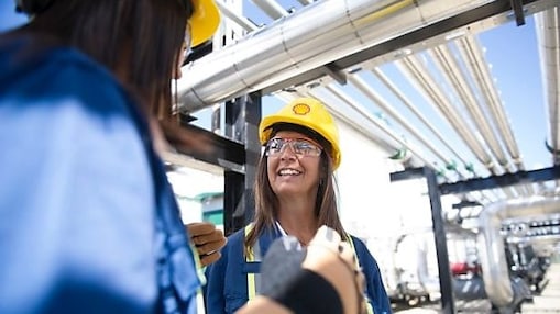 female engineer smiling at an operational site