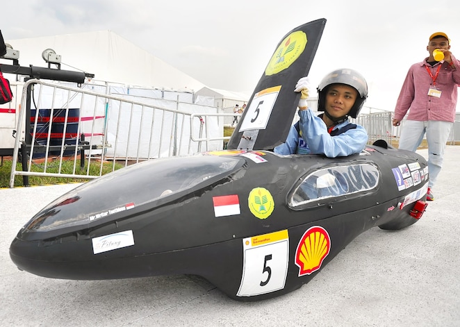 The SI PITUNG, #5, a gasoline prototype vehicle from Batavia Generation Team at the Universitas Negeri Jakarta in Jakarta Timur, Indonesia, gets set to enter the track during day two of the Shell Eco-marathon Asia, in Manila, Philippines, Friday, March 4, 2016.