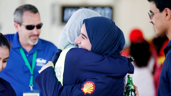 The Faith, #33, a gasoline prototype vehicle from Team Alfaisal at the Alfaisal University in Riyadh, Saudi Arabia, celebrates during the final day of the Shell Eco-marathon Asia, in Manila, Philippines, Sunday, March 6, 2016.