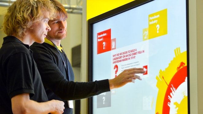 two individuals enjoying event