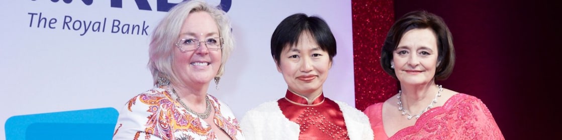 Three women’s are standing at RBS award function.