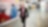 Andy Kneen walking and talking on the phone at a Shell office
