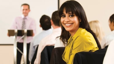 female employee in conference