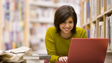 Woman looking at her laptop screen