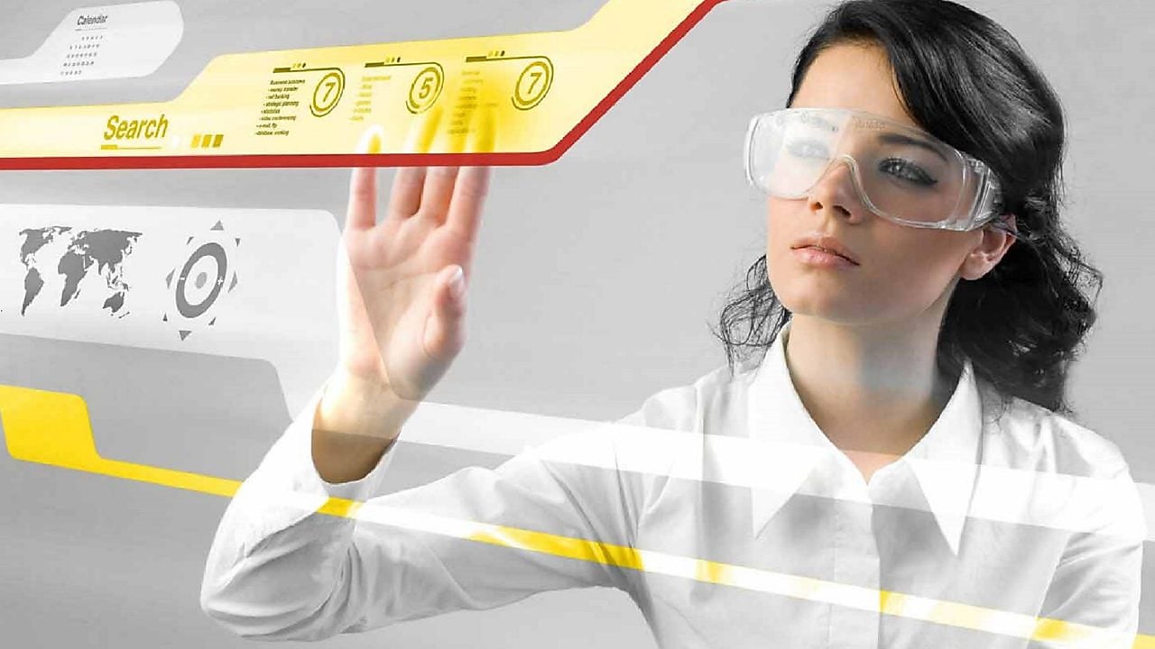 Woman working with a digital touch screen.