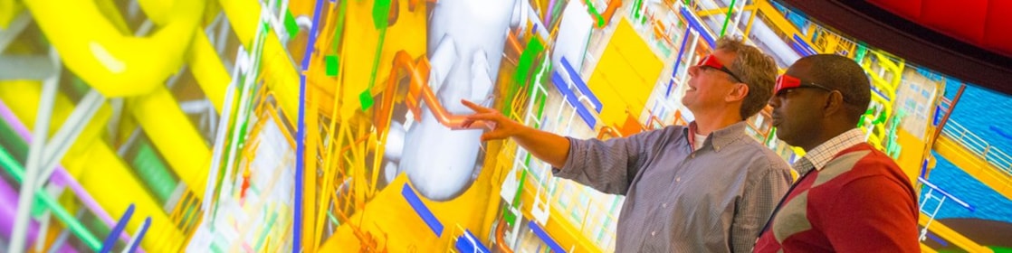 two man watching big screen with 3d glasses