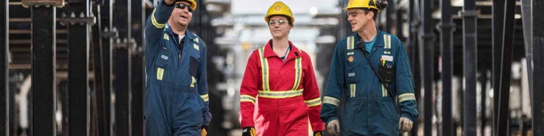 Shell engineers walking together at an operational site