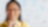 Close up of Asian businesswoman smiling in front of whiteboard