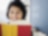 Hispanic woman reading a book