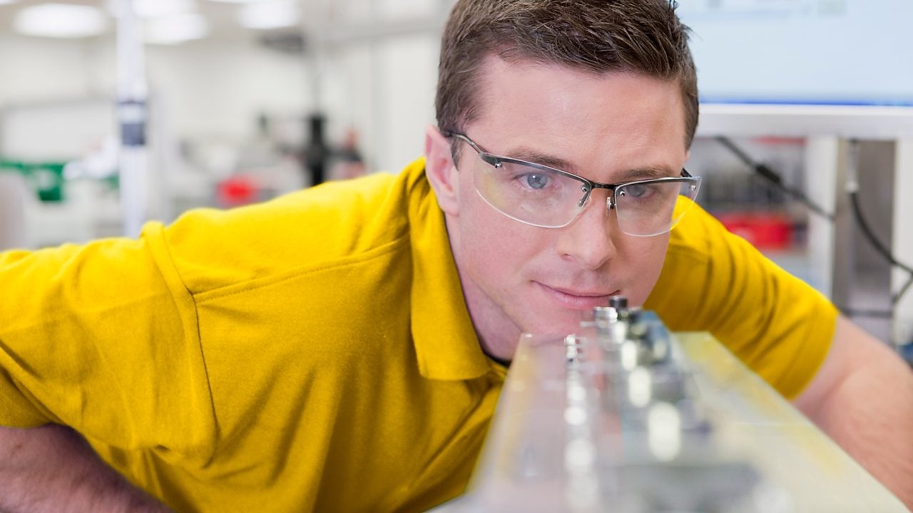 Man looking a instrument in the laboratory