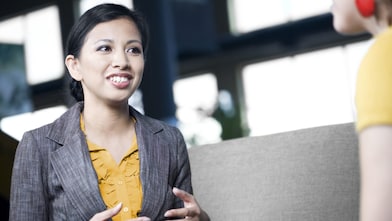 An HR representative talking to an employee