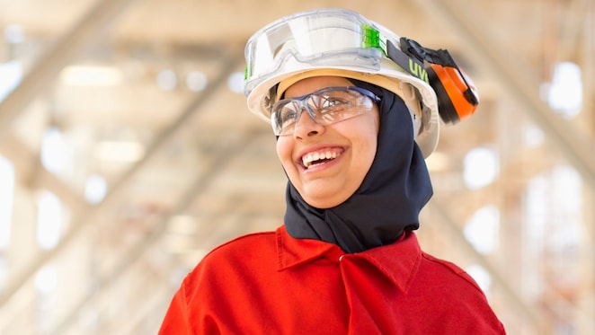 lady in red dress at work place