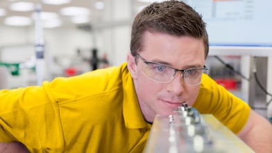 Man looking a instrument in the laboratory