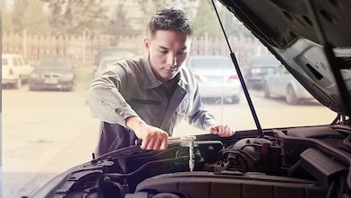 mechanic fixing a car