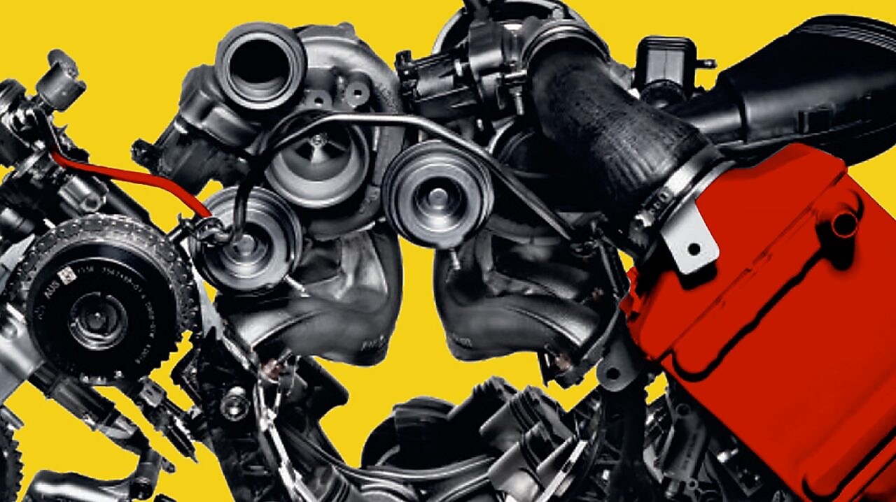 Picture of a car engine, on a yellow background