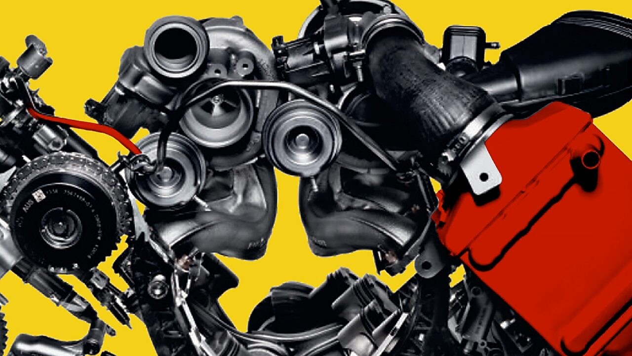 Picture of a car engine, on a yellow background