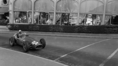 Maurice Trintignant driving his Ferrari Formula 1 car at the Monaco Grand Prix in 1955