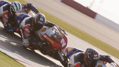 An ATC superbike races around a race track