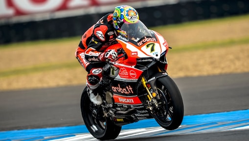 Sportman driving bike and performing stunt