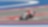 Ducati motorcycle racing around a corner of a racing track
