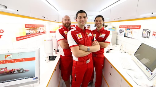 Formula 1 drivers standing in Shell's Track Lab