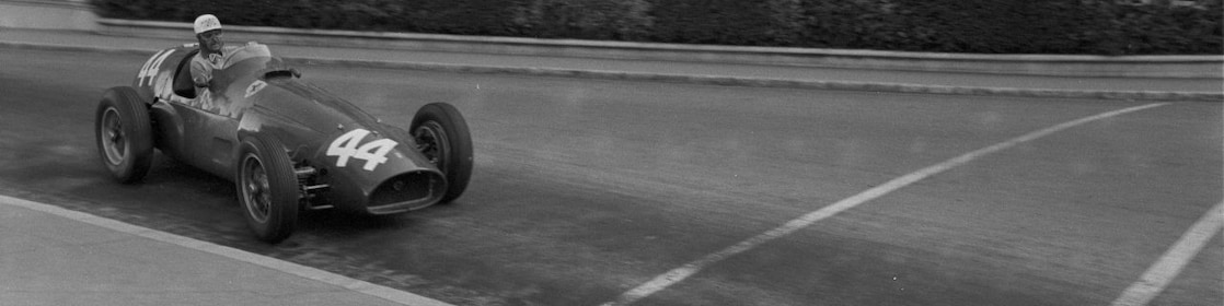 Maurice Trintignant driving his Ferrari Formula 1 car at the Monaco Grand Prix in 1955
