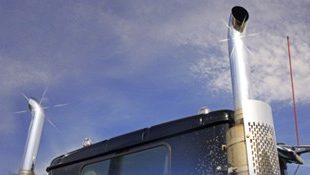 Roof and top of a truck showing exhaust pipes