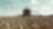 Yellow combine harvester in a wheat field