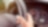 Hand holding a steering wheel
